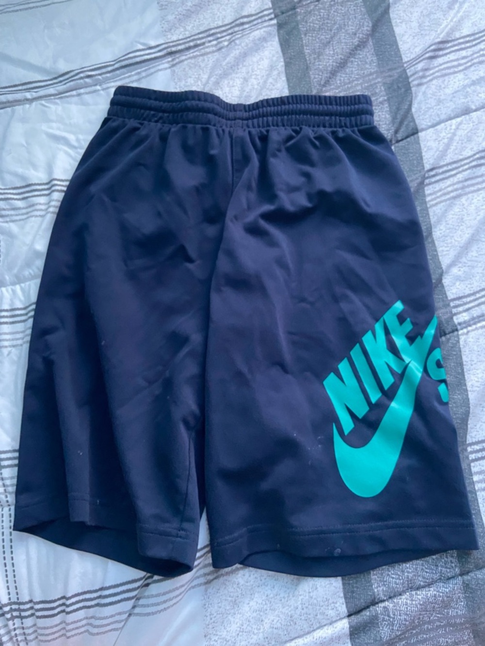 Nike Men’s Black Athletic Shorts with Teal Logo Accent